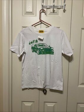4028 White Graphic Tee. Orig tag missing. Brand new 
100% cotton
